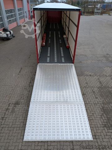 Open semitrailer with tarp  Wiese Gabelstaplertransporter mit Rampe