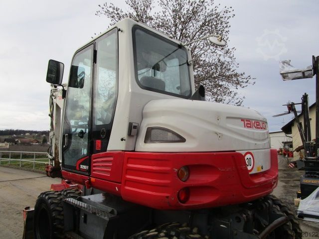 Mobile excavator Takeuchi TB 295W - POWERTILT + Schnellw + 3 Löffel
