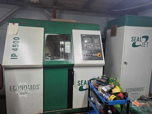 CNC lathe with Economos A sealing jet ECONOMOS IP4500