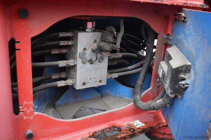 Telescopic boom lift Genie SX 180