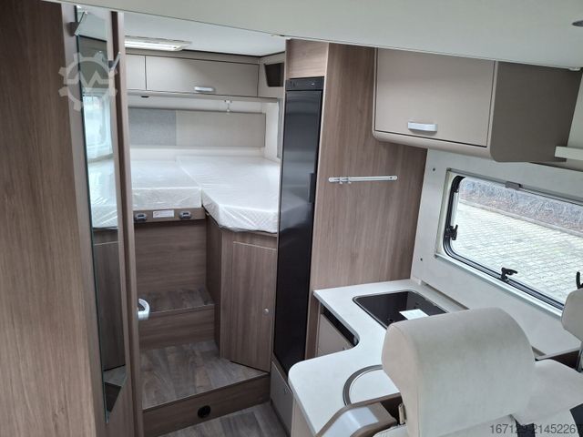 Semi-integrated camper CARADO T 328 pro+ / Safety ACC / Fiat / Hubbett