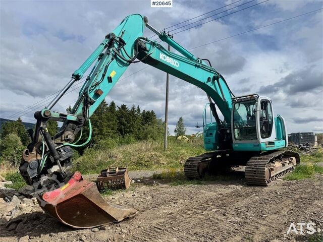 Raupenbagger Kobelco SK235SR Tracked excavator w/ Rototilt and bucket.