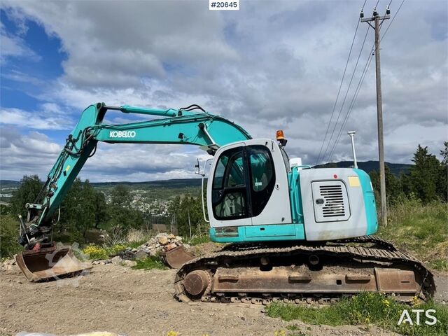 Raupenbagger Kobelco SK235SR Tracked excavator w/ Rototilt and bucket.