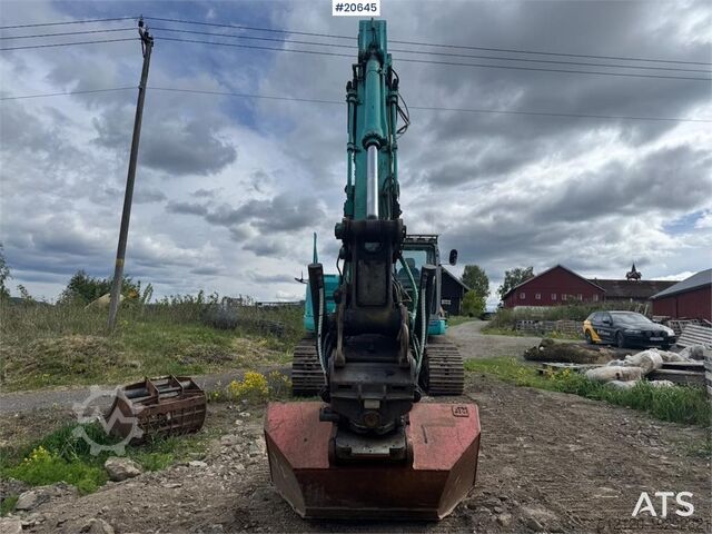Raupenbagger Kobelco SK235SR Tracked excavator w/ Rototilt and bucket.