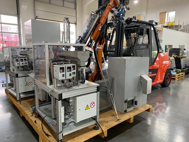 Spritzgießmaschine + Automation Ferromatik Milacron Magna T MTs 275-1540 + Handling