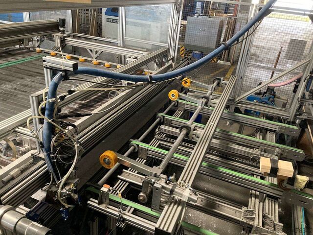 Wasserstrahlschneider & Verklebestation Expert Systemtechnik GmbH Wasserstrahlschneider & Verklebestation