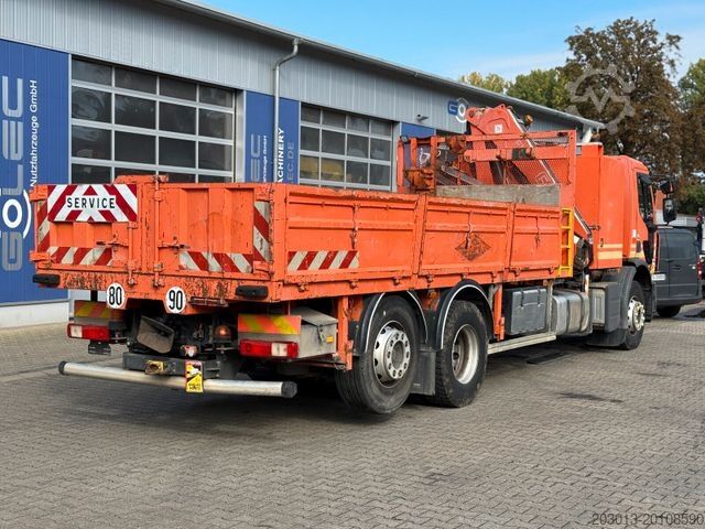 Flatbed truck RENAULT Premium Lander Pritsche mit Kran FASSI
