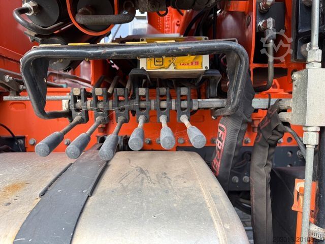 Flatbed truck RENAULT Premium Lander Pritsche mit Kran FASSI