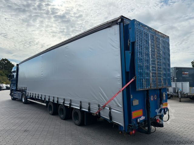Open semitrailer with tarp DINKEL Gabelstapler-Transporter mit Rampe