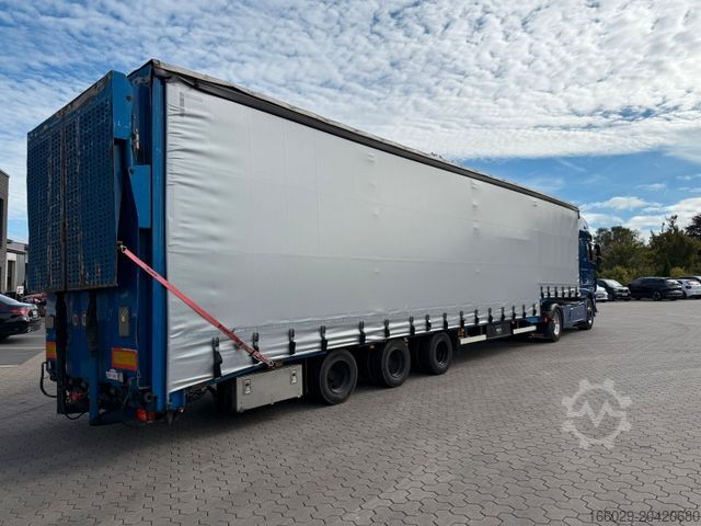 Open semitrailer with tarp DINKEL Gabelstapler-Transporter mit Rampe