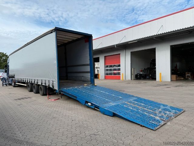 Open semitrailer with tarp DINKEL Gabelstapler-Transporter mit Rampe