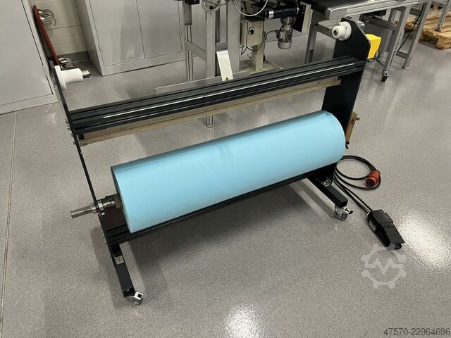 Automatic cloth rewinder for offset Automatic cloth rewinder for offset printing machines Vliesstoff Kasper