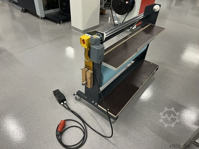 Automatic cloth rewinder for offset Automatic cloth rewinder for offset printing machines Vliesstoff Kasper