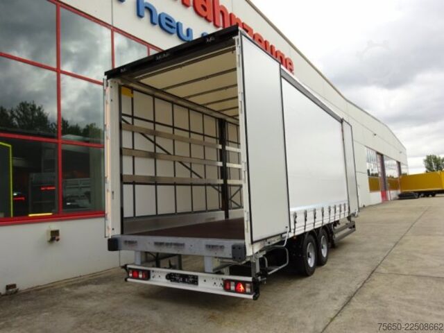 Open trailer with tarp Möslein TPW 105 D Schwebheim  Tandem- Planenanhänger Durchladen