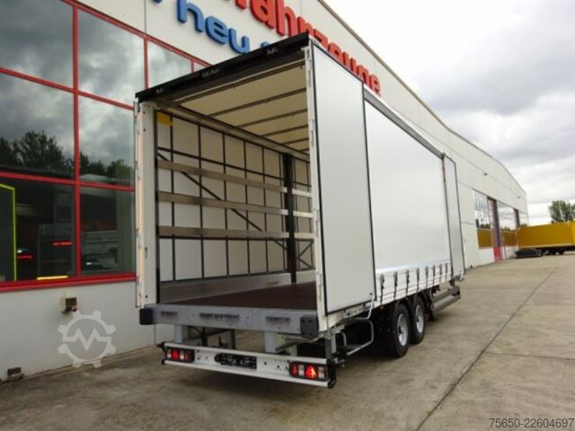 Open trailer with tarp Möslein TPW 105 D Schwebheim  Tandem- Planenanhänger Durchladen