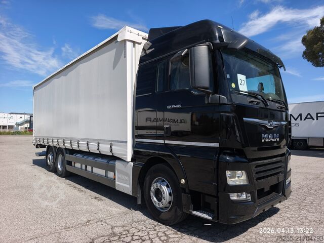 Flatbed truck with tarp MAN 26.420 TGX 6X2 EURO 6