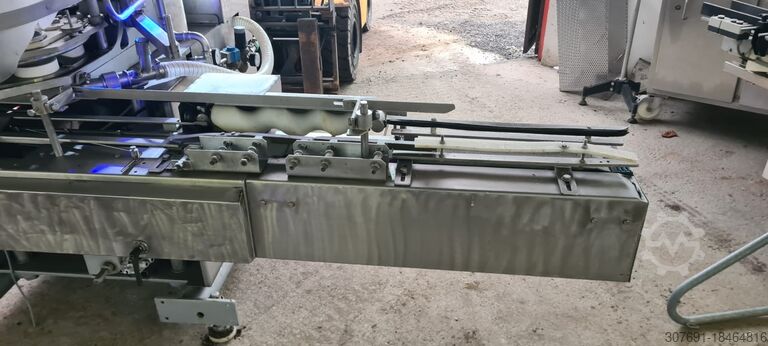 Container filling system filling machine Volumenfüller Fillingmaschine Fillig Hema