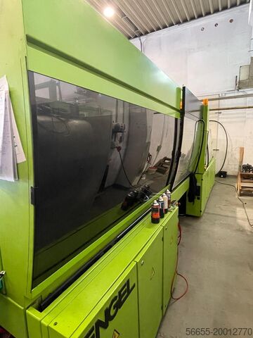 Injection moulding machine including handling Engel ES2050