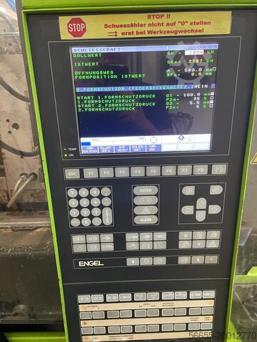 Injection moulding machine including handling Engel ES2050