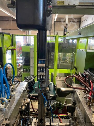 Injection moulding machine including handling Engel ES2050