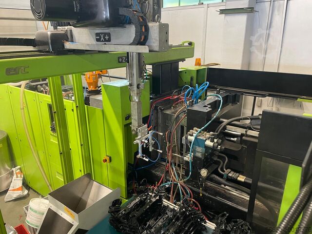 Injection moulding machine including handling Engel ES2050