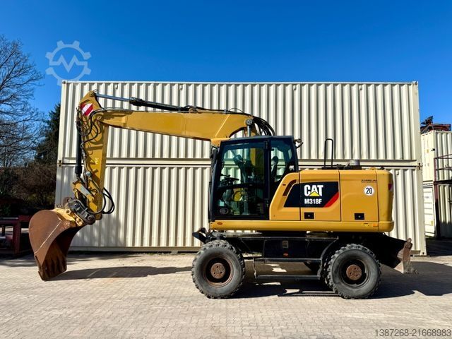 Mobilbagger CATERPILLAR M318F / 9.852 H / Deutsche Maschine