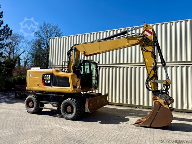 Mobilbagger CATERPILLAR M318F / 9.852 H / Deutsche Maschine