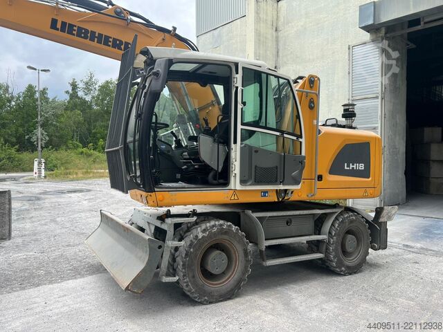 Liebherr wheeled excavator including sorting grapple Liebherr LH 18 M Litronic