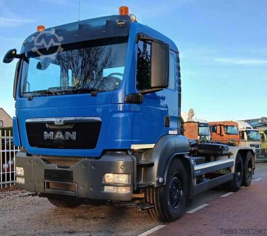 Roll-off tipper truck MAN TGS 33440