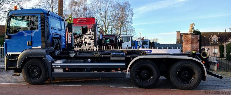 Roll-off tipper truck MAN TGS 33440