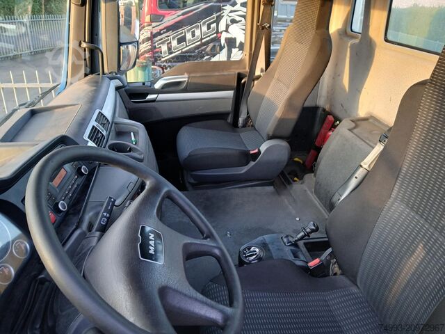 Roll-off tipper truck MAN TGS 33440