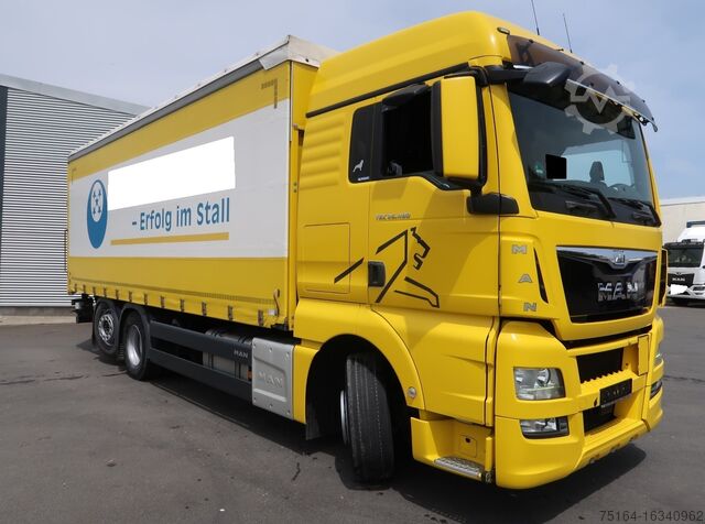 LKW mit Pritsche & Plane MAN TGX 26.480 LL 6x2 Nachlauflenkachse