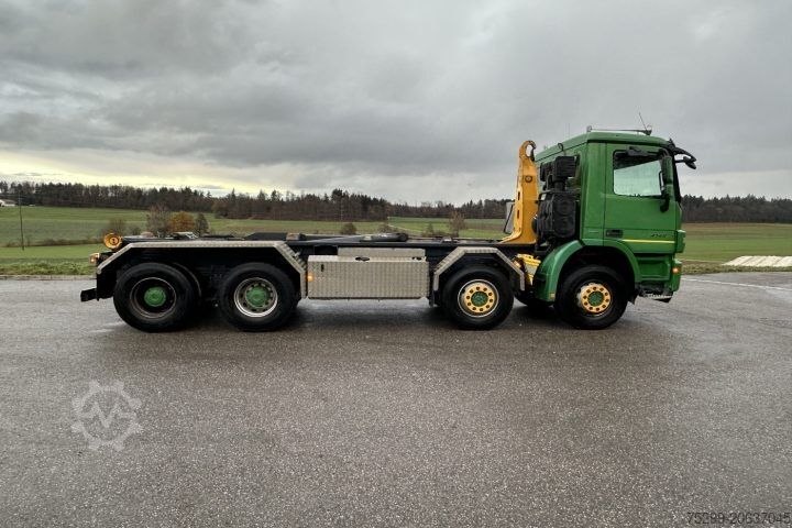 Roll-off tipper truck Mercedes-Benz Actros 4148 8x4 Moser / Swiss-Vehicle