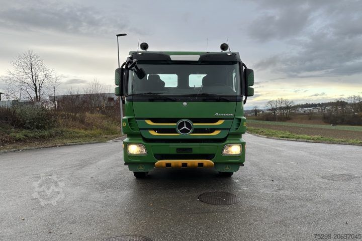 Roll-off tipper truck Mercedes-Benz Actros 4148 8x4 Moser / Swiss-Vehicle