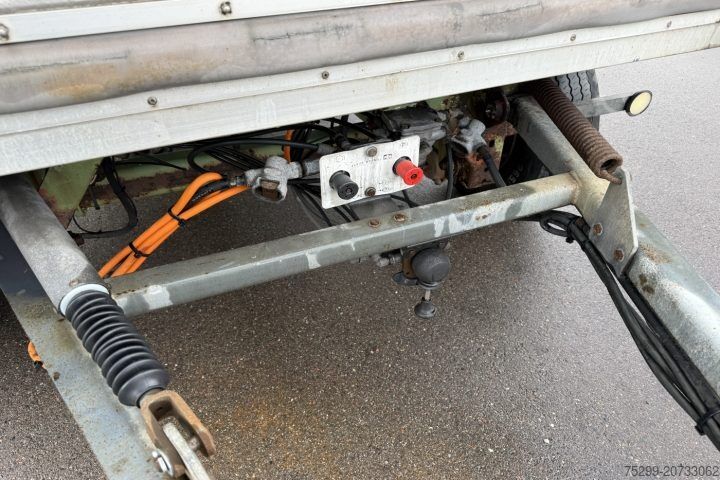 Open trailer with tarp  A 100H Plane/HB