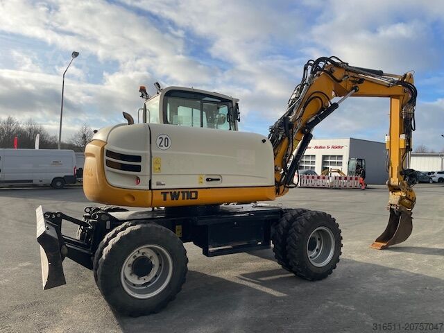 Mobilbagger Schaeff TW110 inkl.Powertilt & Greifer