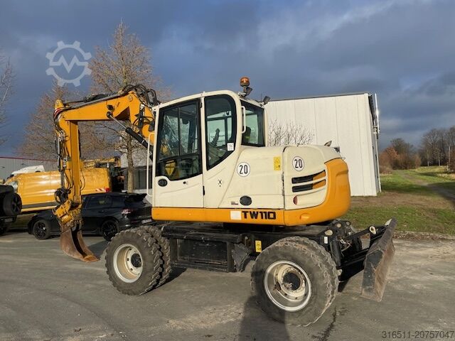 Mobilbagger Schaeff TW110 inkl.Powertilt & Greifer