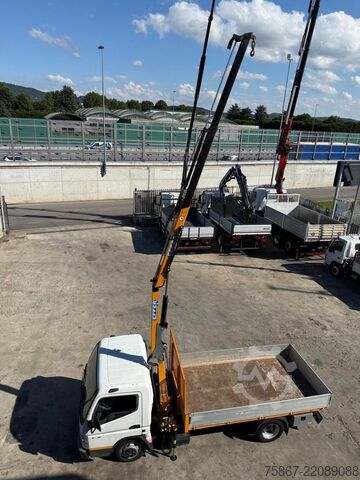 Truck with fixed flatbed Mitsubishi Canter 3C15