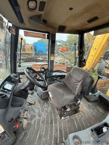 Backhoe loader NEW HOLLAND B 115 c