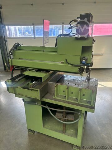 Coordinate drilling machine, drilling machine  