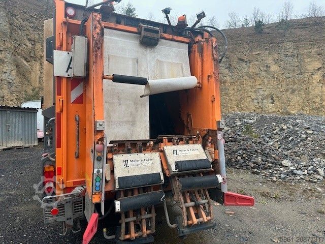 Garbage truck MAN TGS 28.320 6x2-4 BL FAUN VarioPress/ Zöller /24