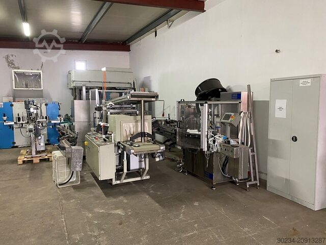 Line For Packaging Liquid Products Into Plastic Bottles With Dose Up To 750 ml Tang OG Weiss AS ASK 450