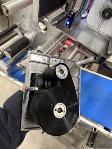 Labeling with printer top and bottom Zodiac Labeling with printer top and bottom Zodiac