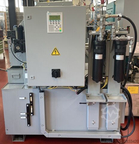 CNC turning machine with bar feeder INDEX C100