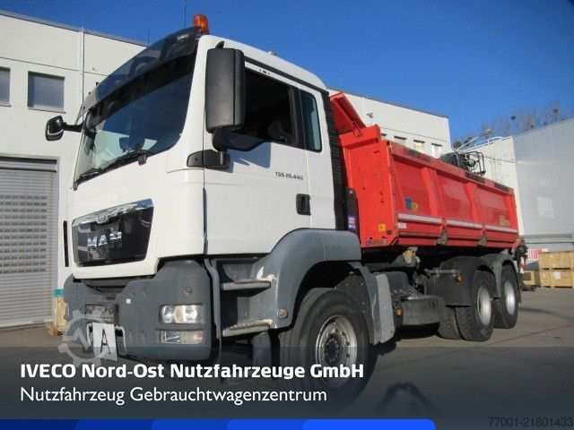 Tipper truck MAN 26.440 / 6 x 4 / Jonsered 1100 / Greifer