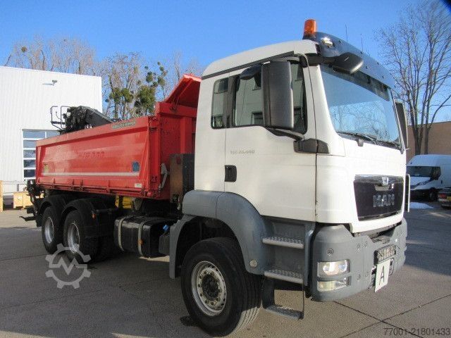 Tipper truck MAN 26.440 / 6 x 4 / Jonsered 1100 / Greifer
