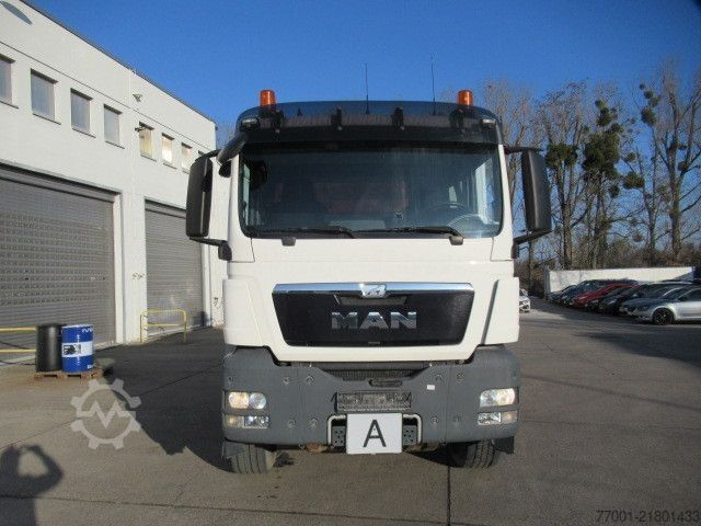 Tipper truck MAN 26.440 / 6 x 4 / Jonsered 1100 / Greifer