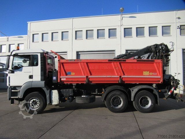 Tipper truck MAN 26.440 / 6 x 4 / Jonsered 1100 / Greifer