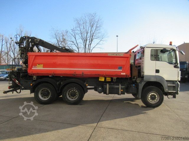 Tipper truck MAN 26.440 / 6 x 4 / Jonsered 1100 / Greifer