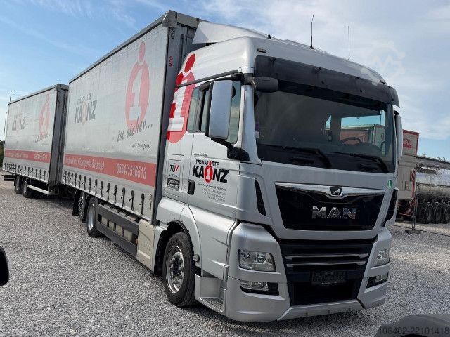 Flatbed truck MAN TGX 26.500 6x2 LL Jumbozug